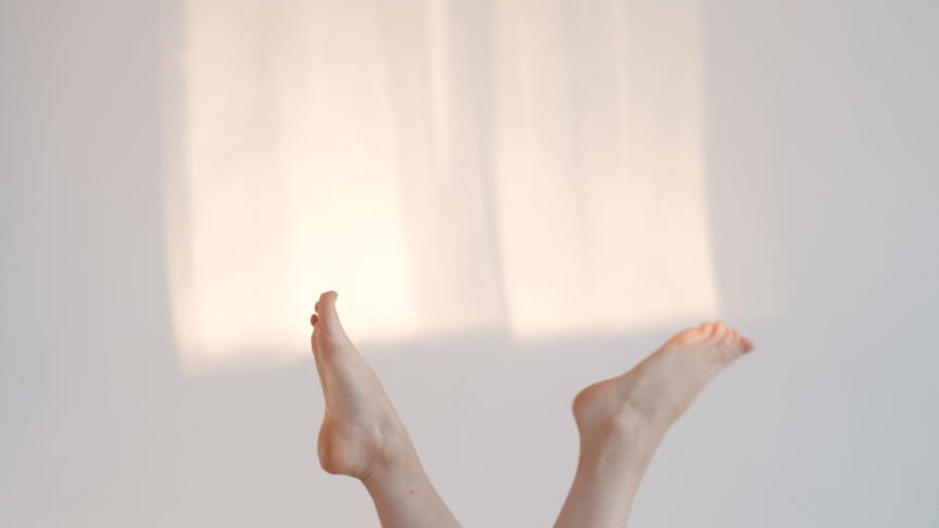 A serene and spacious room with soft lighting, perfect for mindful movement.